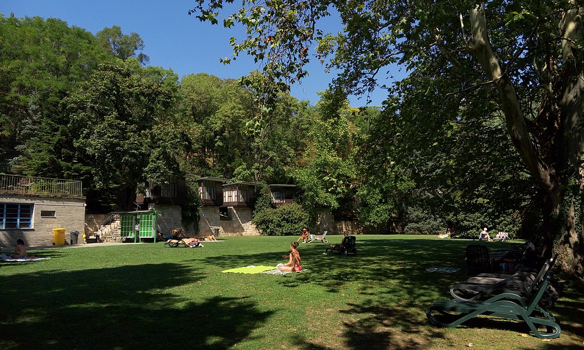 The forest-like parkland area of Csillaghegyi thermal bath in Budapest