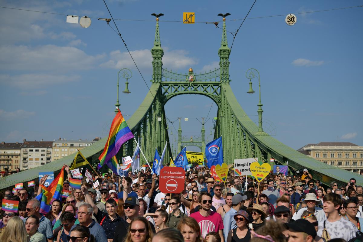 People marching on the Liberty Bridge during Budapest Pride