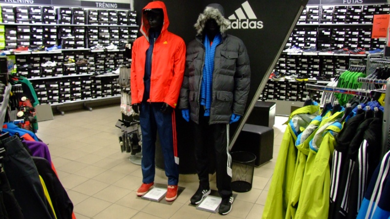 Close up of the interior of the Adidas Outlet in Budapest, showing mannequins in Adidas tracksuits
