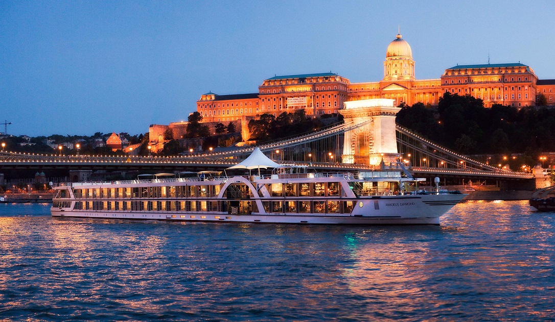  Boats on the Danube by nightfall with the Buda Castle in the background in Budapest