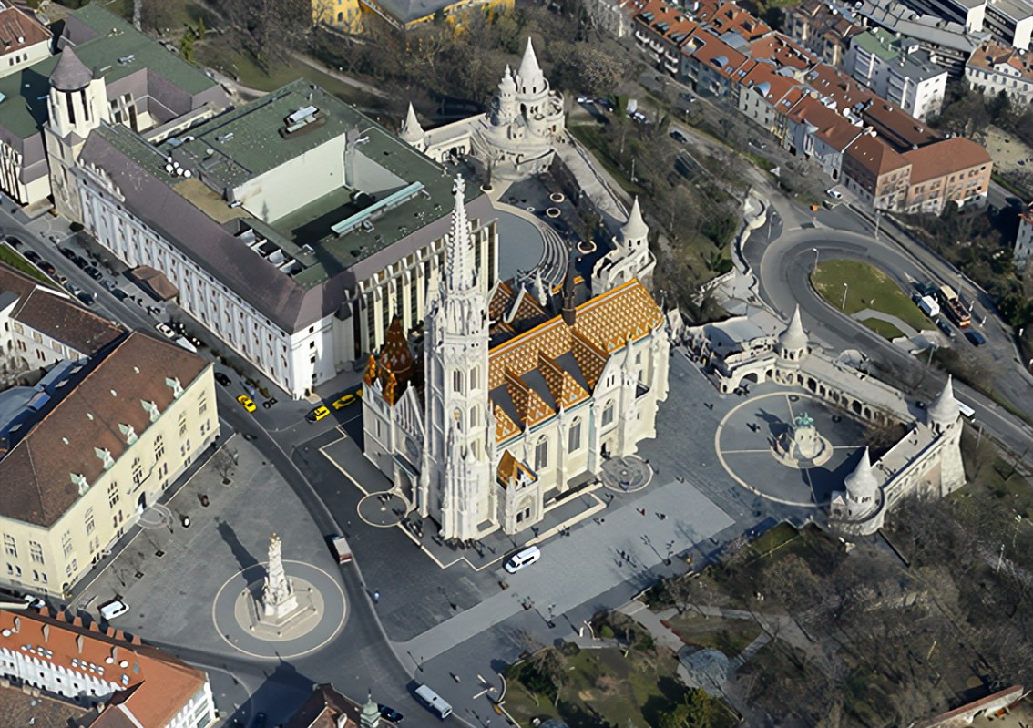 The Fisherman's Bastion surrounded by the Szentháromság Square,  the Matthias Church  and the statue of Saint Stephen 