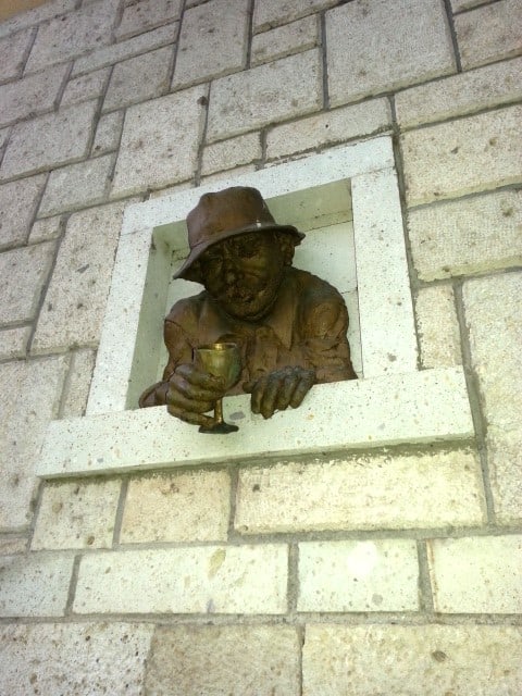 Statue on the wall of a wine cellar, Tokaj