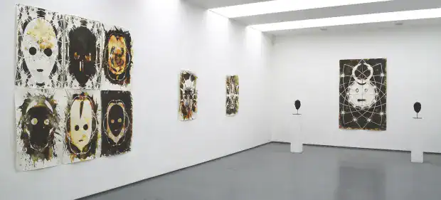 Surrealist artworks displayed on the walls of acb Gallery in Budapest