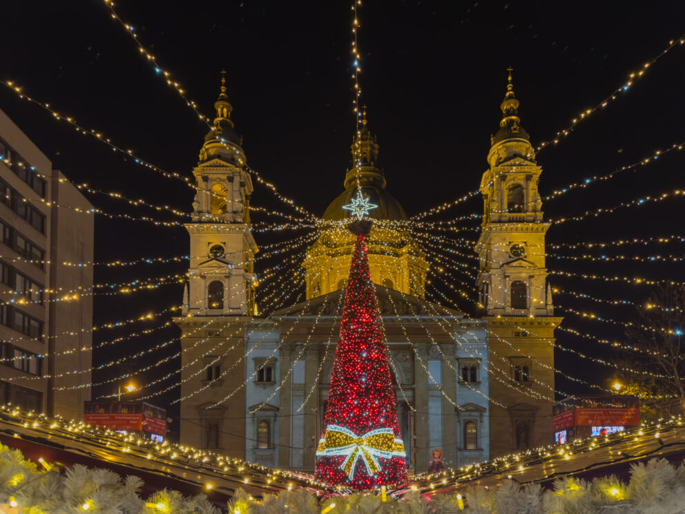 The grand St. Stephen's Basilica behind a giant decorated Christmas tree