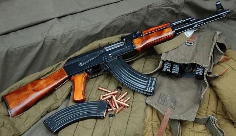An AK-47 assault rifle with its magazine and ammunition