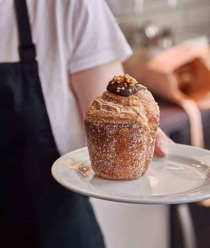 A diverse selection of fresh pastries on display at Arán Bakery