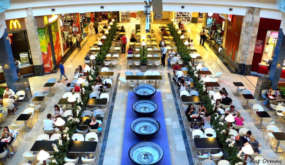 The spacious food court area at Arena Mall with various restaurants
