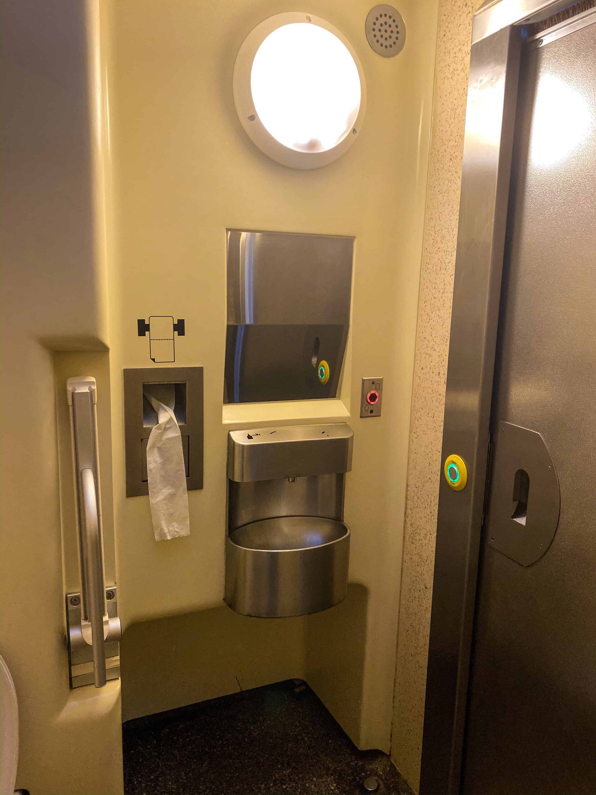 The clean and functional interior of a Budapest automated public toilet