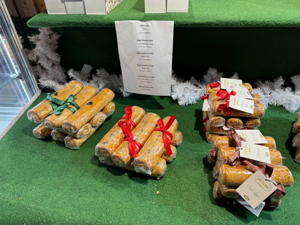 Traditional Hungarian bejgli poppy seed rolls wrapped with festive red ribbons