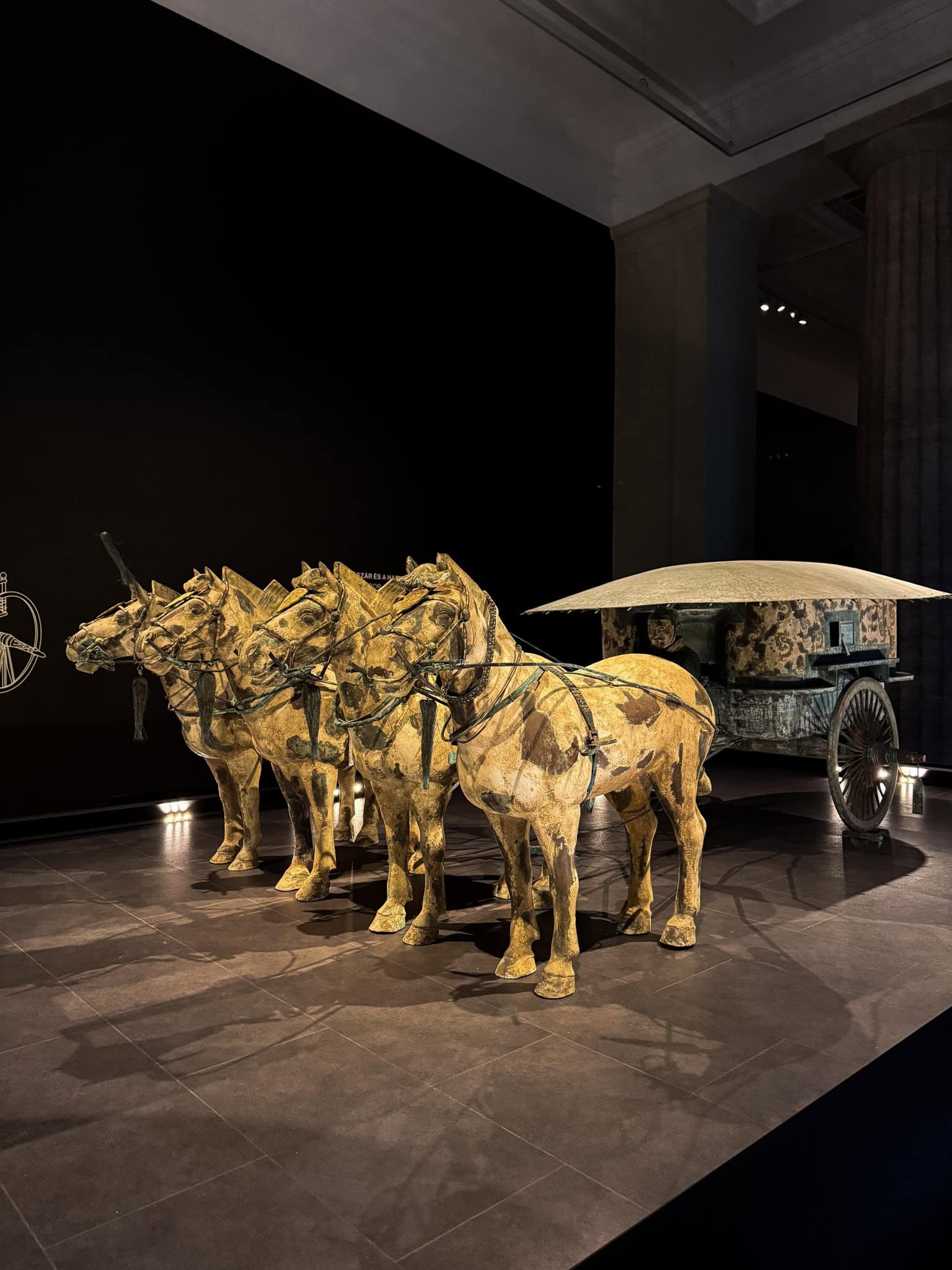 Replica of a bronze ancient Chinese horse-drawn chariot at the exhibition