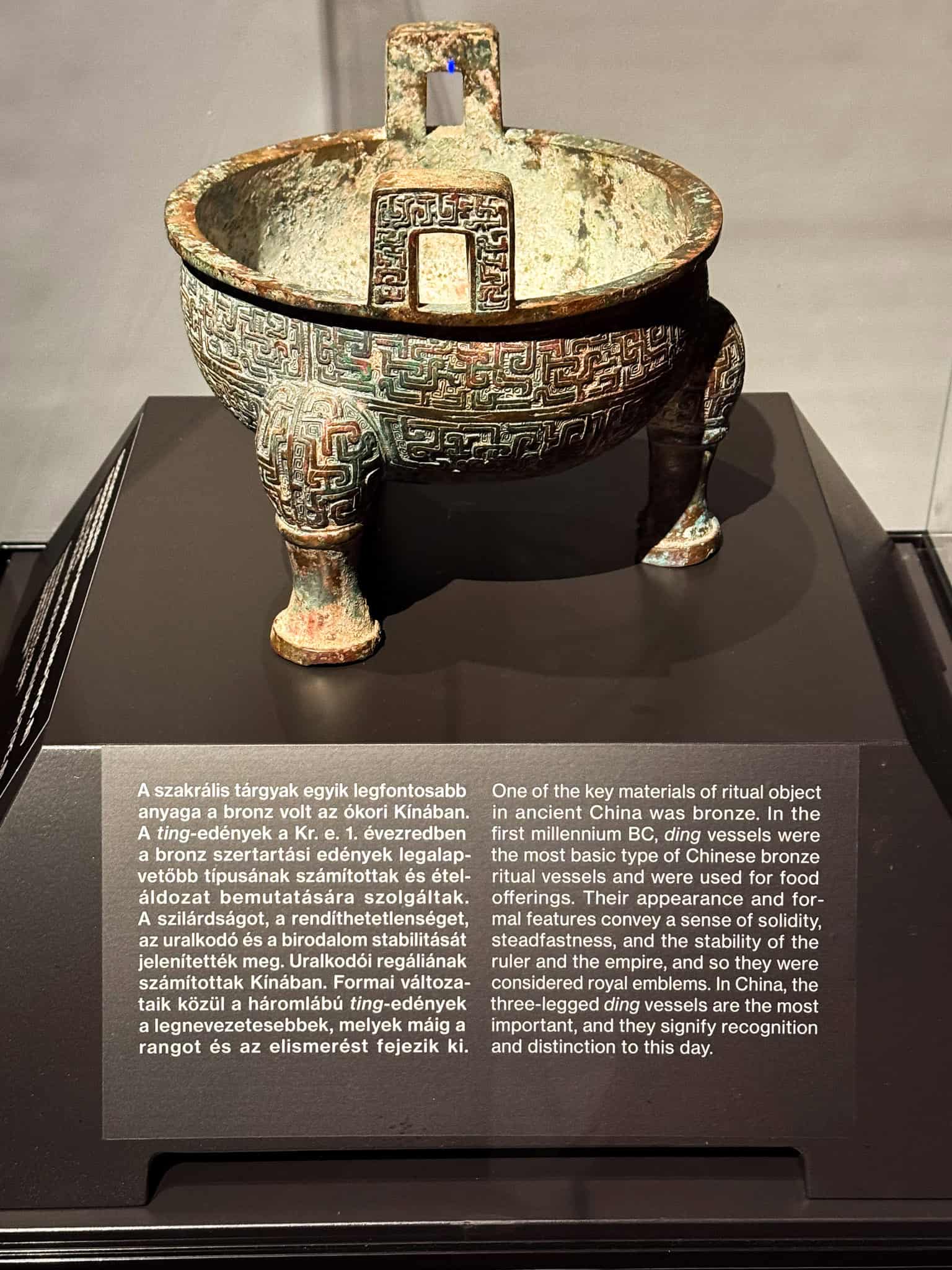 A green-patinated bronze ritual vessel (Ding)