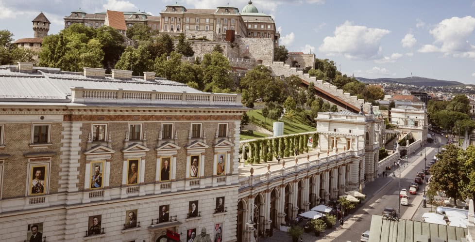 The two historic wooden cars of the Buda Castle Hill Funicular passing each other