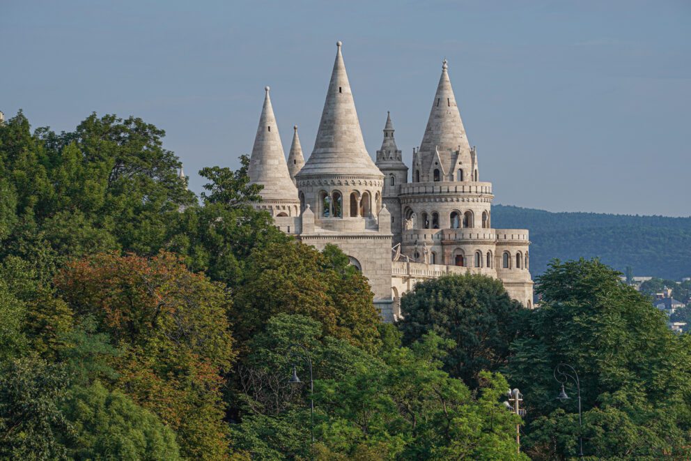 The grand green copper dome and classical columns of the Buda Castle Palace