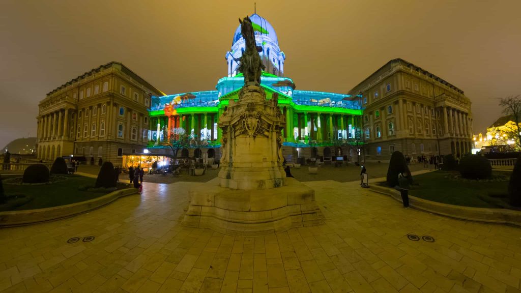 Panoramic view of the spectacular Christmas light projection on the Hungarian National Gallery at Buda Castle Savoyai Terrace