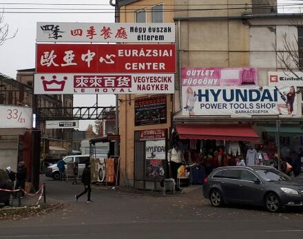 Crowds dining under red lanterns at the Budapest Chinatown Summer Night Market