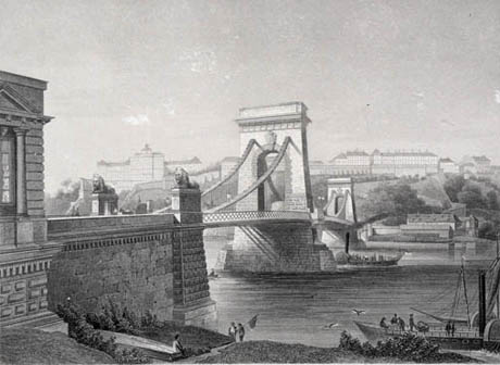 A golden sunset panorama of the Chain Bridge and Hungarian Parliament