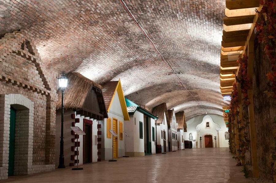 Clear subterranean thermal water filling a deep karst cave in Budapest