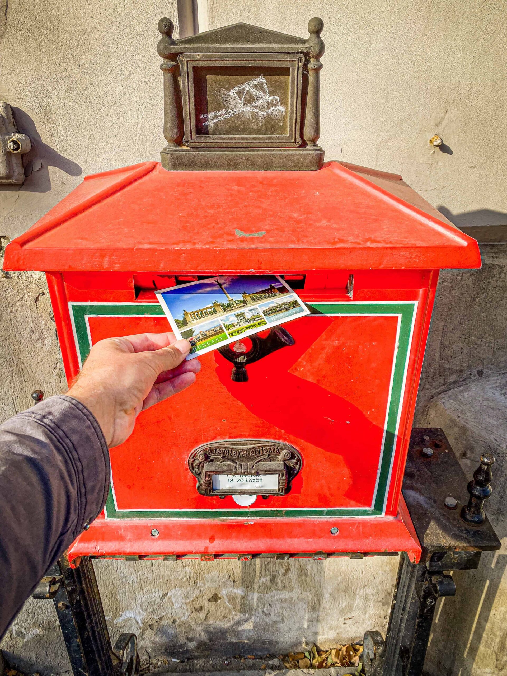 A variety of colorful tourist postcards showing beautiful Budapest landmarks