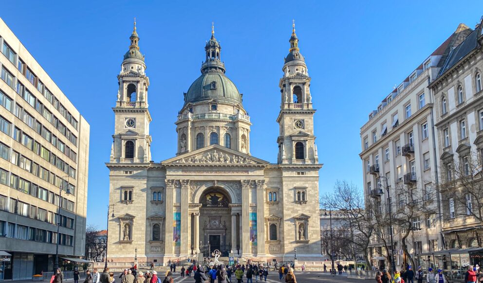 Tourists on a guided walking tour through the historic streets of Budapest in winter