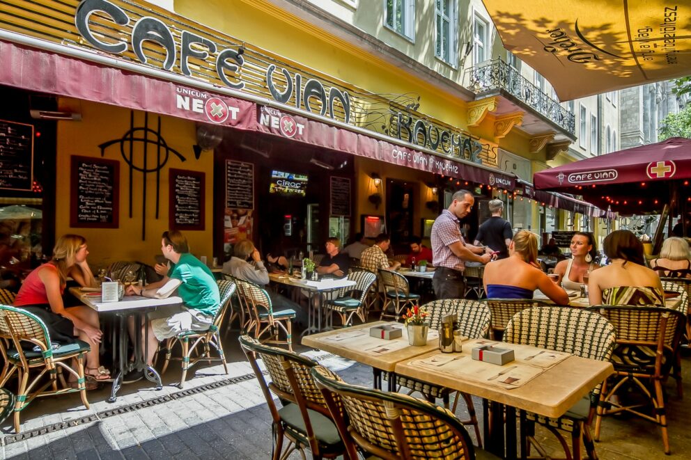 The lively outdoor terrace of Café Vian in Liszt Ferenc Square