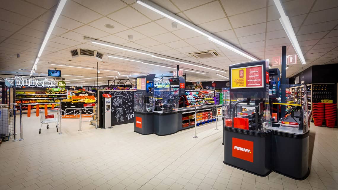 The modern exterior of a CBA Prima store in Budapest