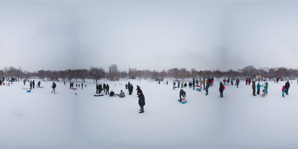 Panoramic view of visitors ice skating at the huge City Park Ice Rink