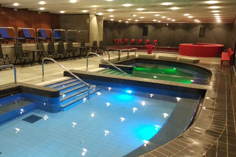The massive indoor adventure pool and indoor slide complex at Csillaghegyi Bath