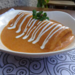 Hortobágyi palacsinta (Hungarian stuffed crepes Hortobágy [JE5] style) made from ground chicken paprikash
