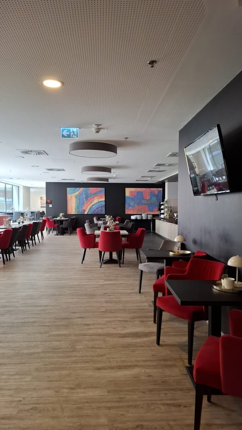 The incredibly sleek, pristine modern bathroom design inside a Dormero Hotel room