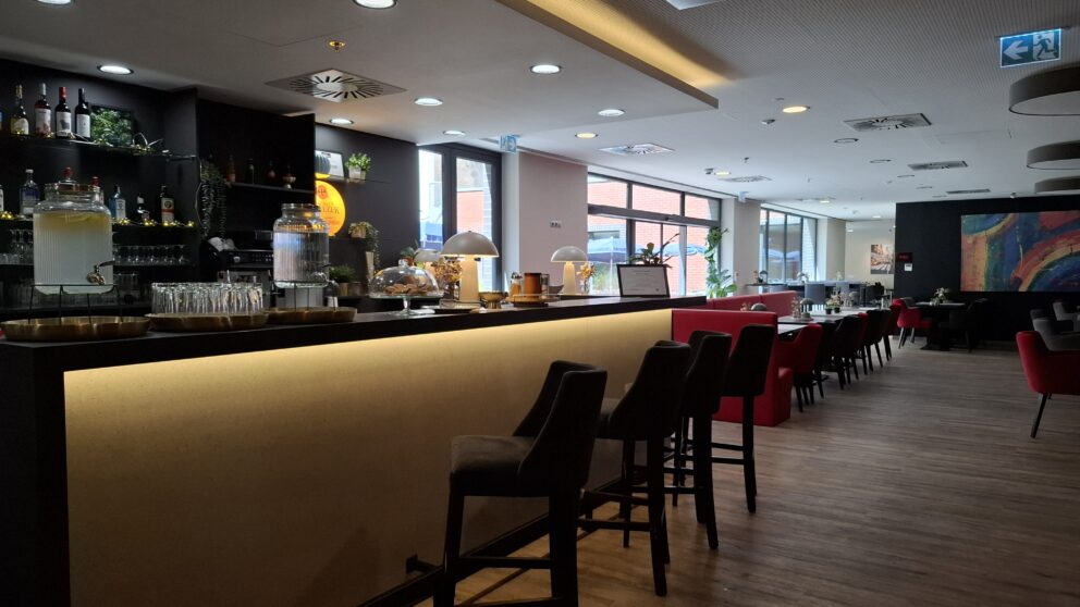 The stylish seating arrangements in the bright breakfast dining area of the Dormero Hotel