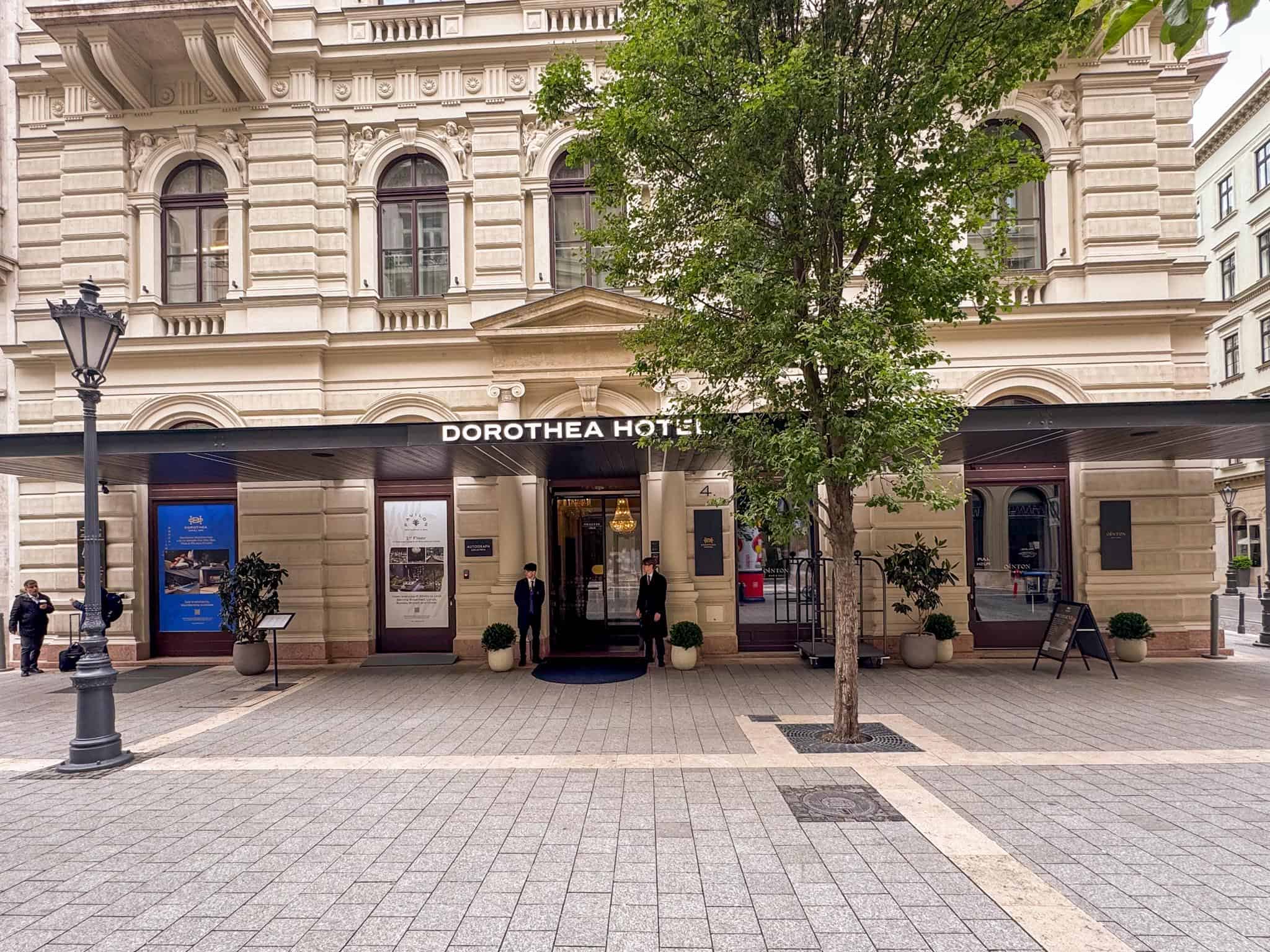 The subtly dramatic illuminated front entryway safely belonging to the high-end Dorothea Hotel