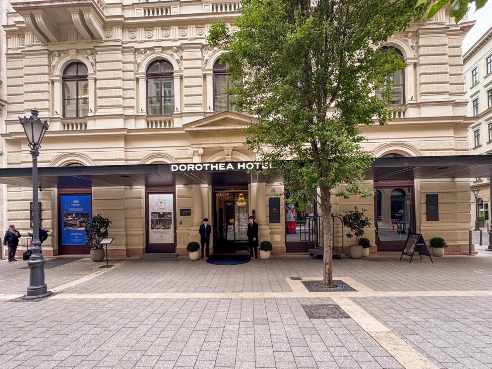 The elegantly restored classic stone facade and main entrance of the Dorothea Hotel