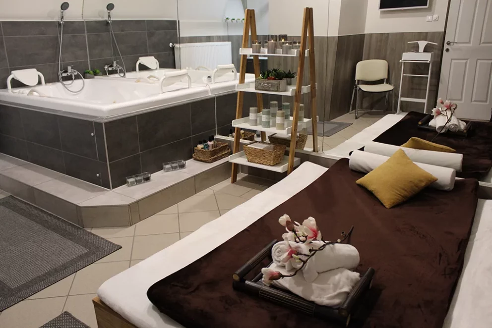 The atmospheric and intimate neon-lit interior of Dreamhouse Massage in Budapest