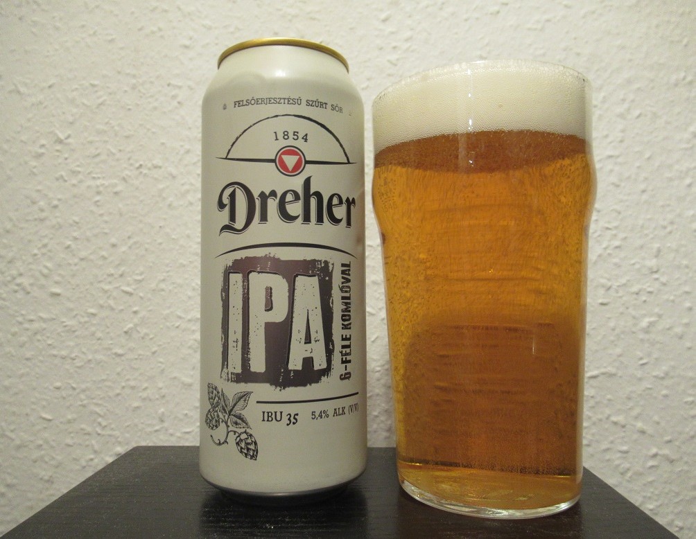 A perfectly poured pint of Dreher Classic beer with a thick white foam head