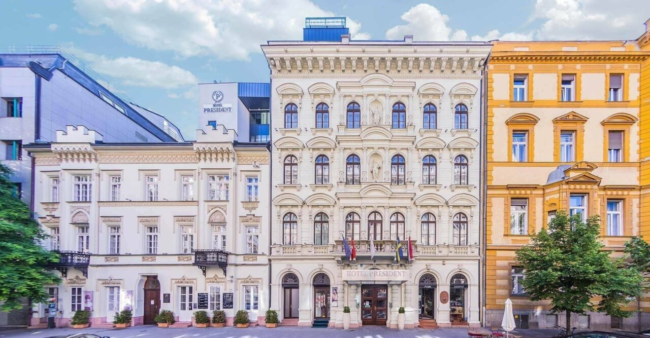 Families dining together at an extensive morning breakfast buffet in a hotel