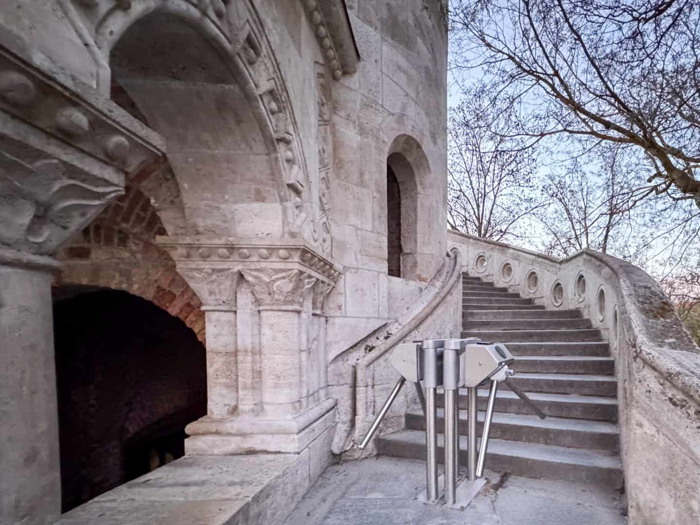 Metal scanning turnstiles at the entrance to the upper paid viewing terrace of the Bastion