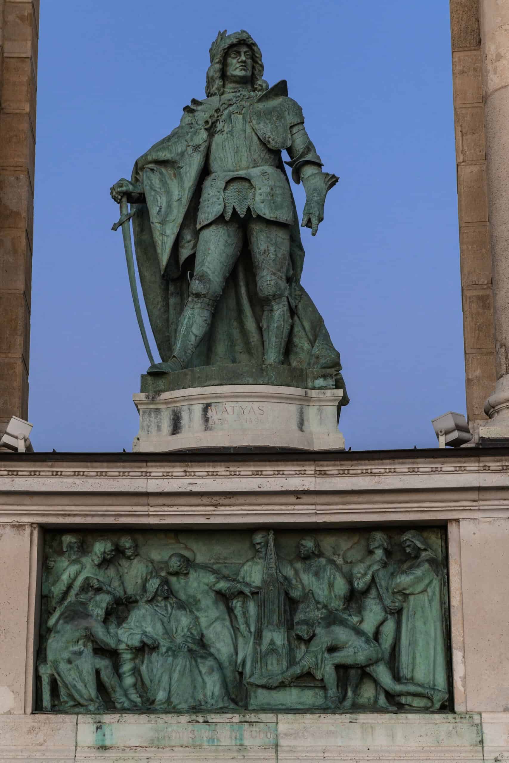 The statue of Prince Gábor Bethlen of Transylvania standing in the right colonnade