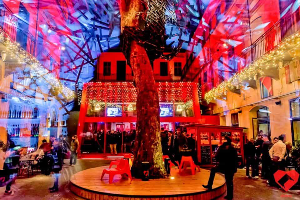 The massive, iconic wooden King Kong statue with glowing eyes climbing a tree inside Doboz