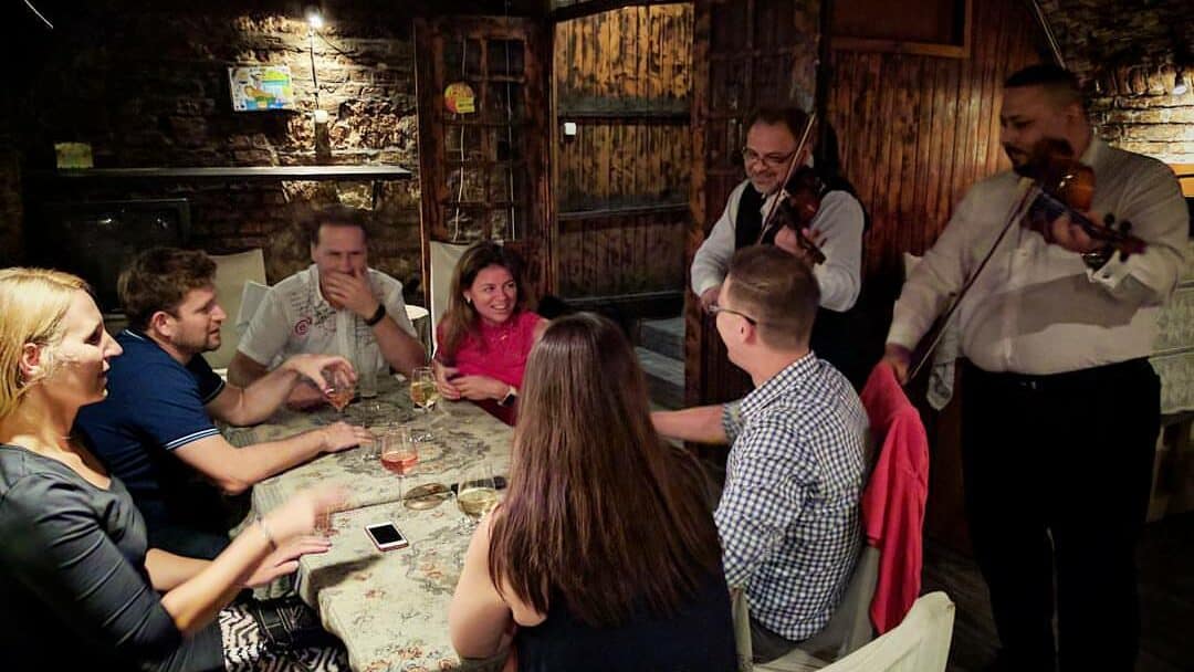 A live music performance inside the intimate Giero pub in Budapest