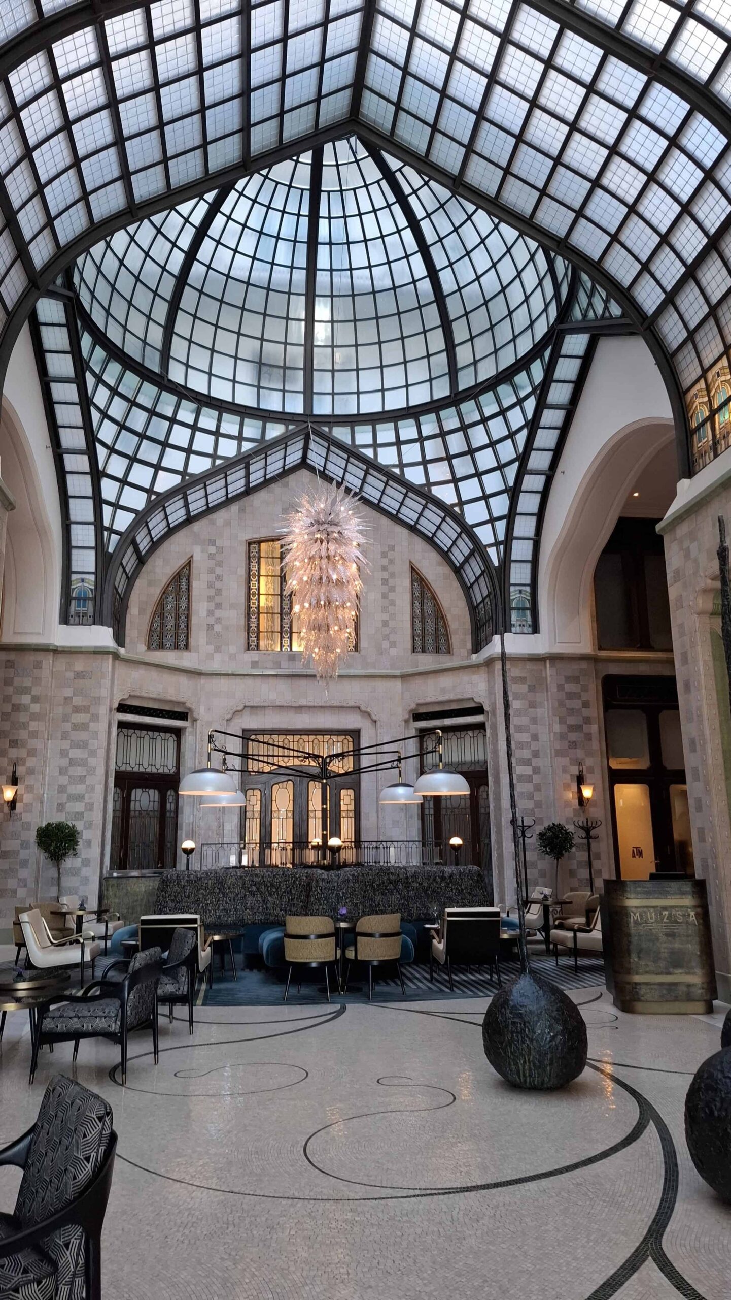 The ornate Art Nouveau interior and mosaic floor of Gresham Palace