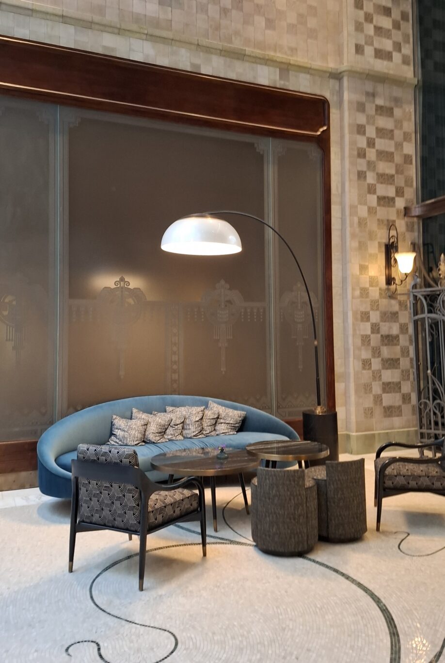 The stunning stained-glass cupola and massive crystal chandelier inside the main hotel lobby