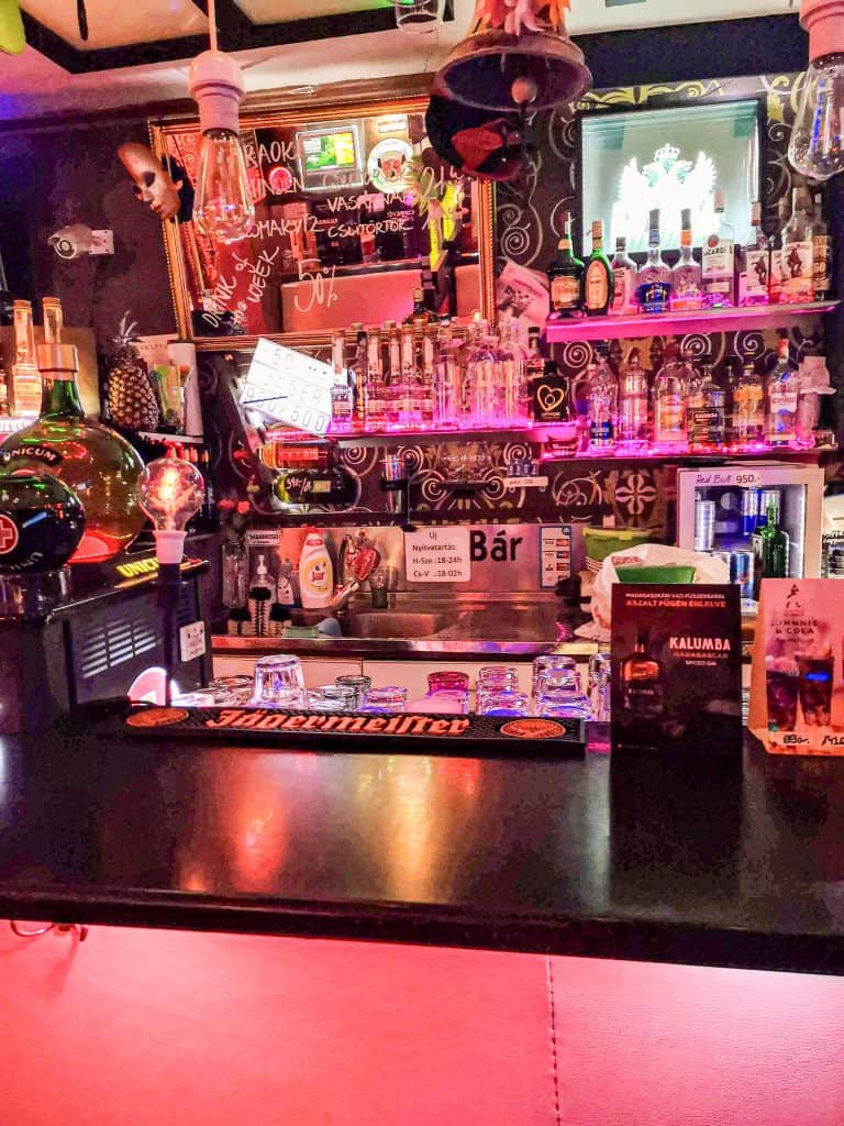 The unassuming wooden entrance door to the Habrolo gay pub in Budapest