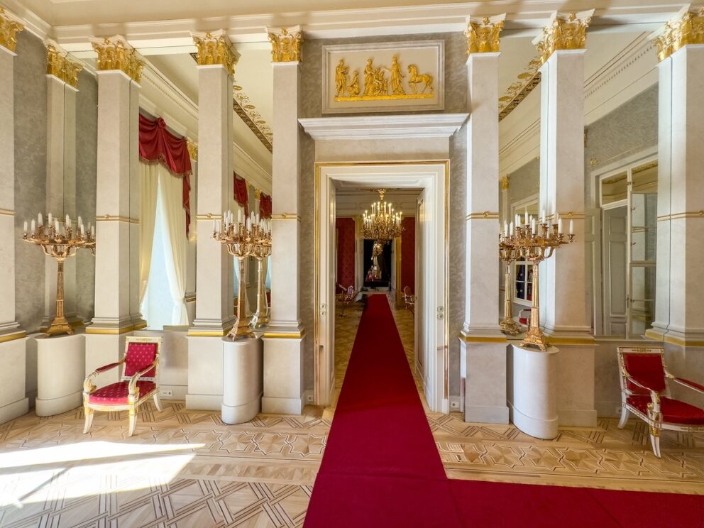 Close-up of the gold and white stucco details in the Hall of Mirrors