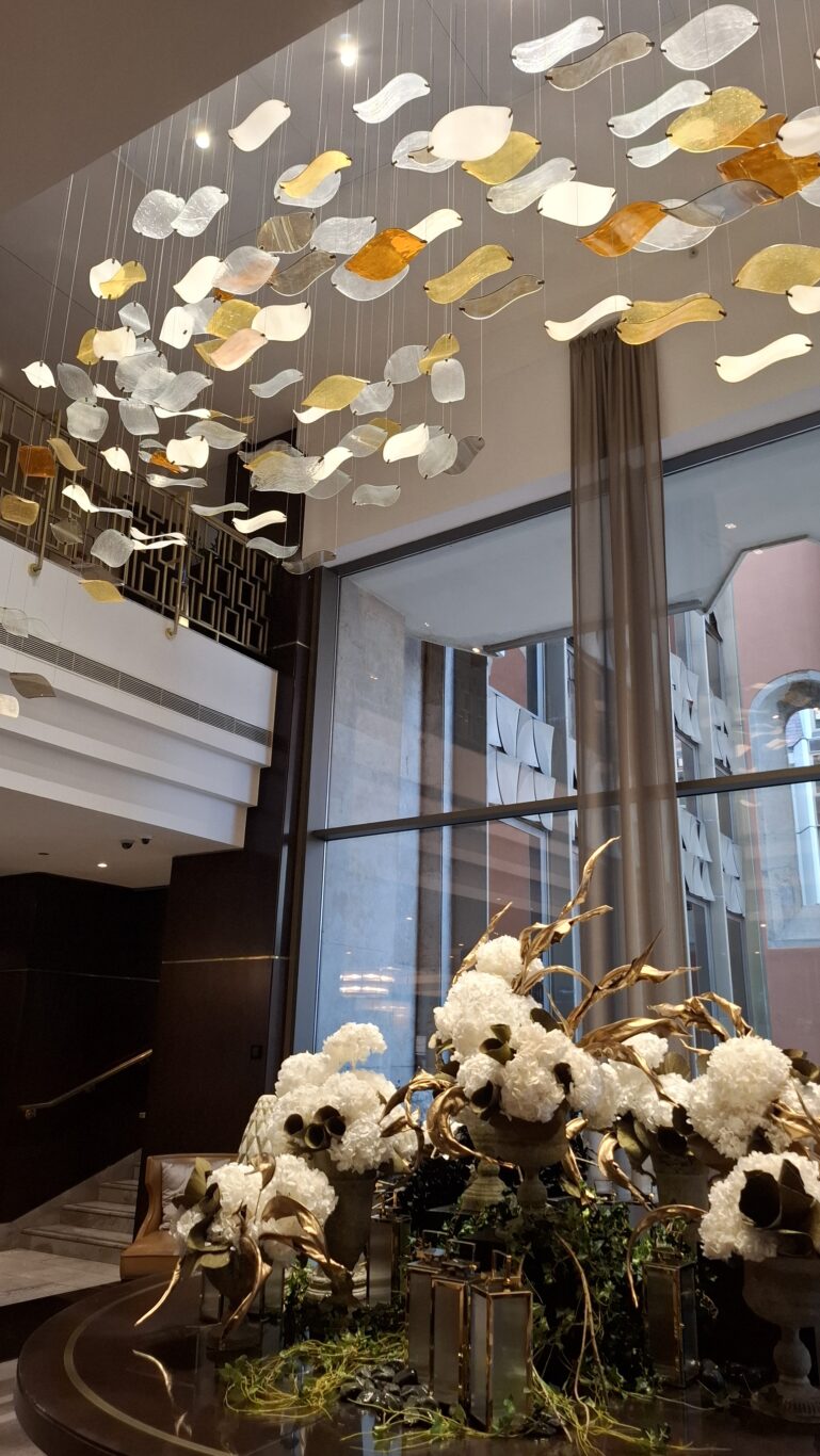 Authentic medieval stone ruins of a Dominican cloister preserved inside the Hilton Hotel courtyard