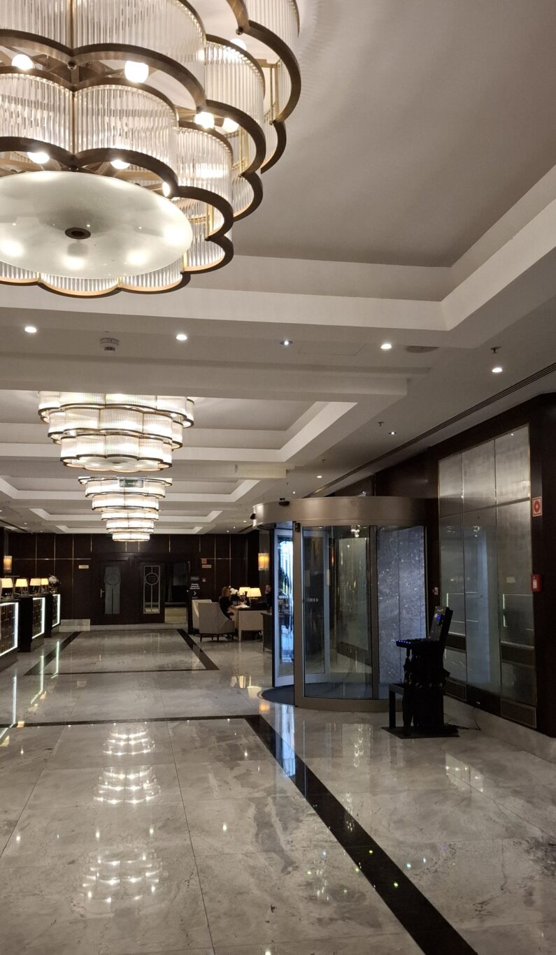 The elegant modern seating area inside the lobby bar of the Hilton Budapest