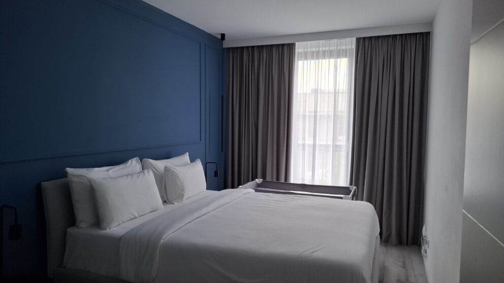 Curated modern art and interior design details inside a Hotel Collect room