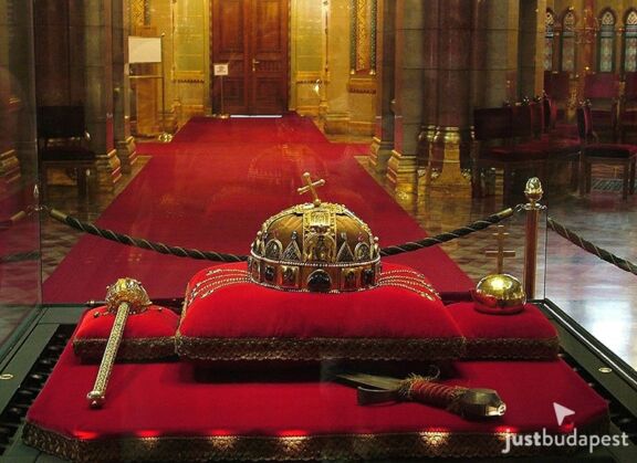 The famous Hungarian Holy Crown of St. Stephen resting on a red velvet pillow