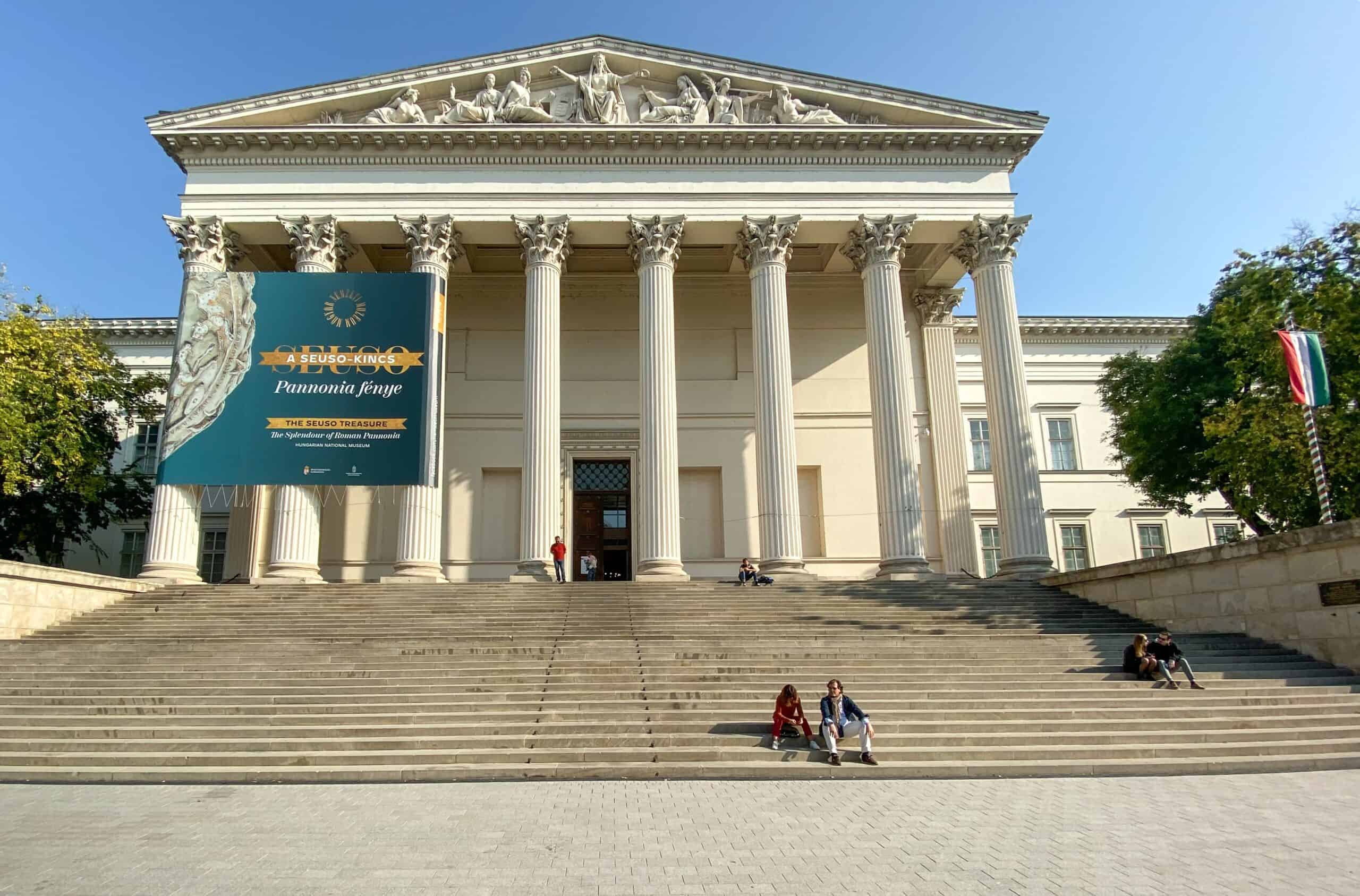 The neoclassical facade and grand steps of the Hungarian National Museum in Budapest