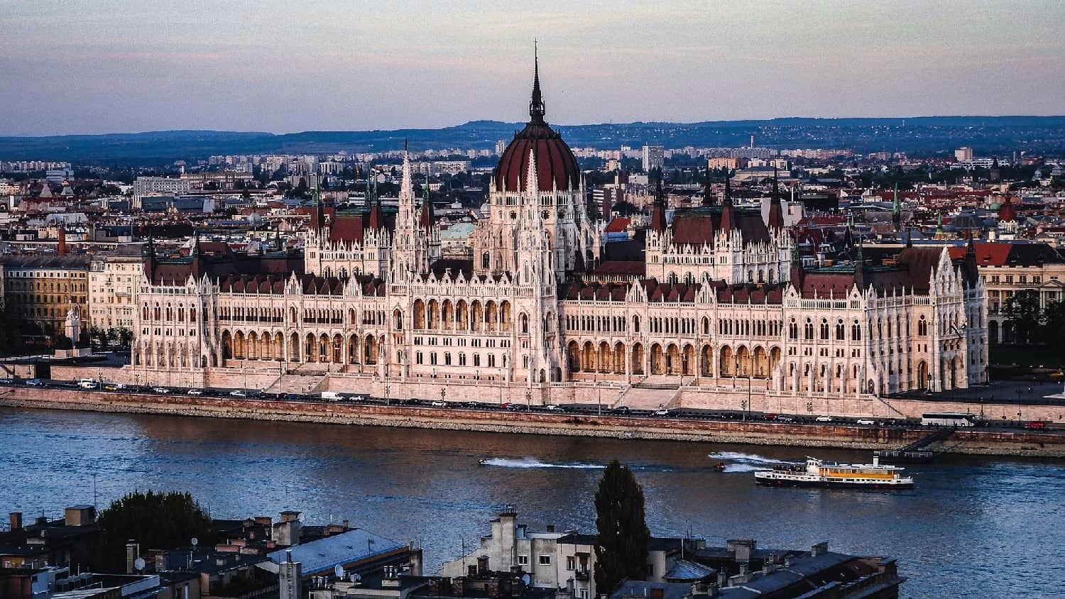 The magnificent Hungarian Parliament Building across the Danube on a clear spring day