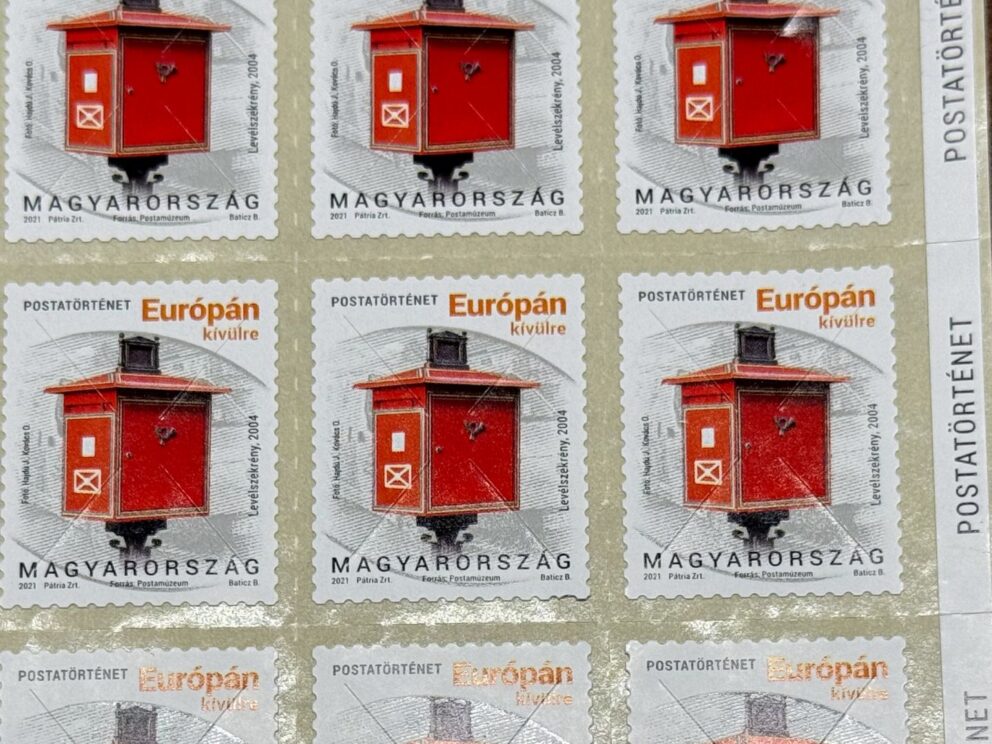 A sheet of Hungarian postal stamps for outside Europe featuring a red postbox
